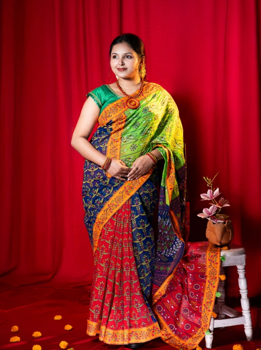 Prijosree Signature Boutique –Multicolour Weave Print Saree with tarsel and doller design