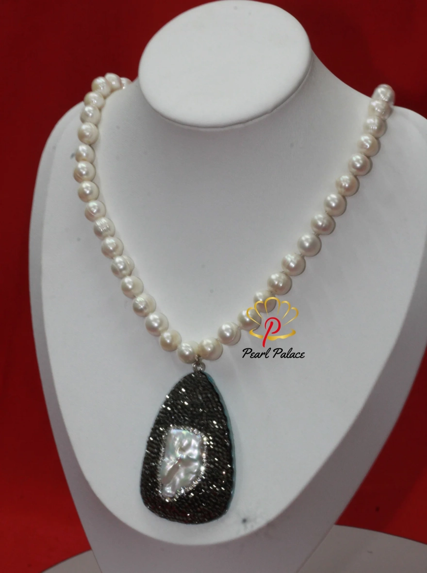 White Pearl Necklace with Black Crystal and Shell Pearl Pendant.