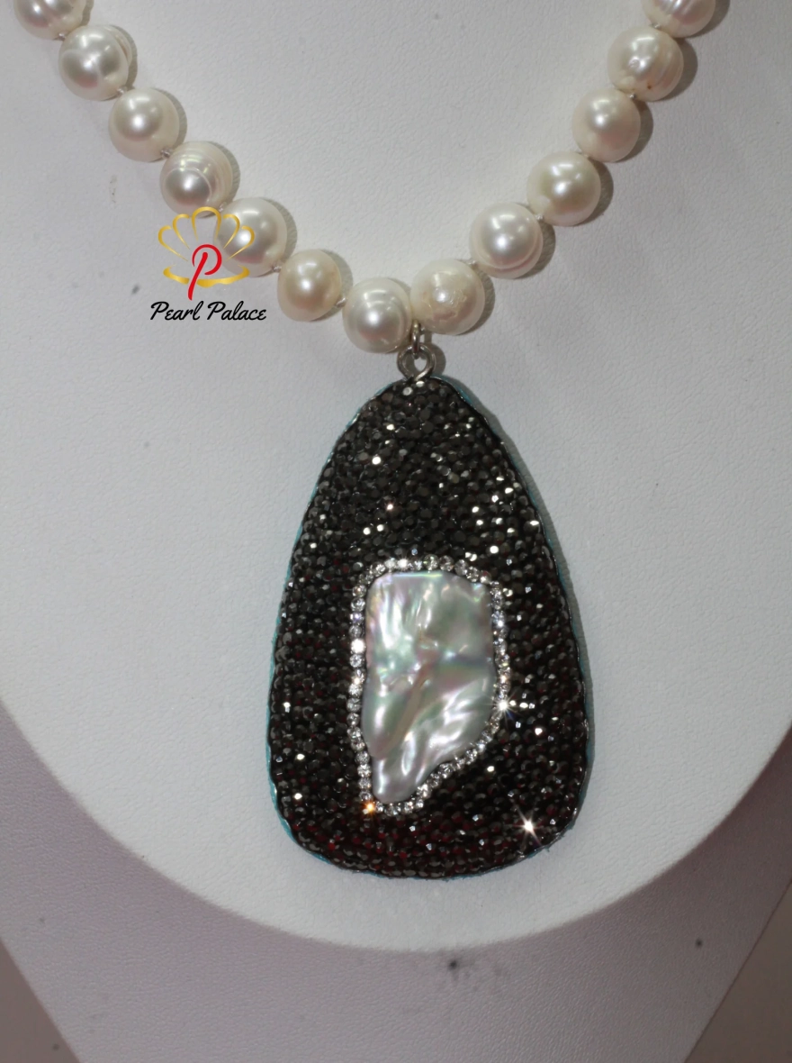 White Pearl Necklace with Black Crystal and Shell Pearl Pendant.
