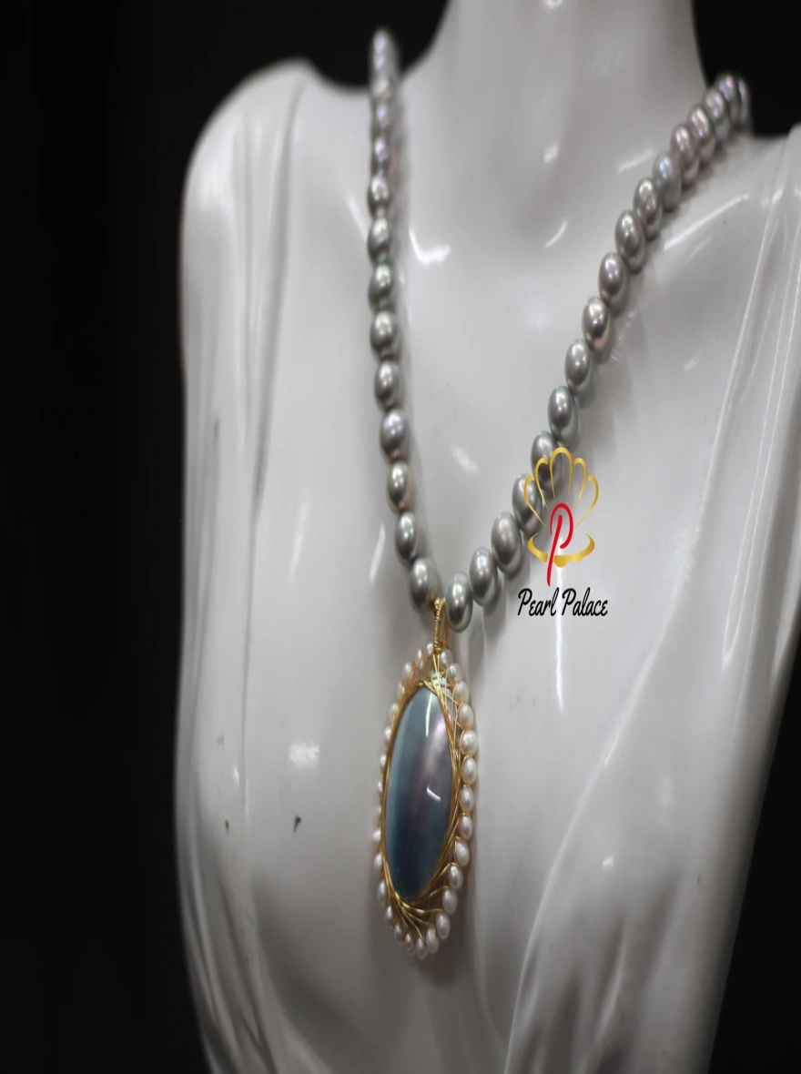 White Pearl Necklace with Shell Pearl Pendant.