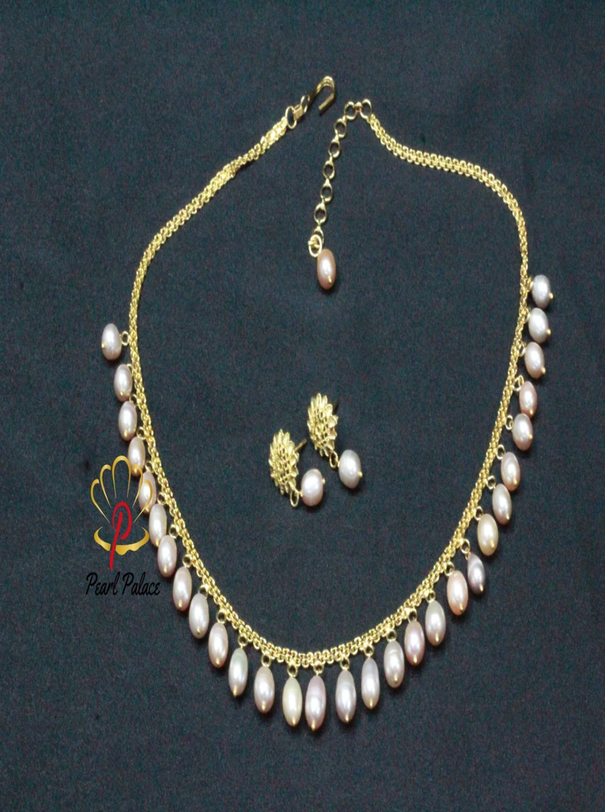 Peach Rice Pearl and Gold-Plated Necklace and Earring Set.