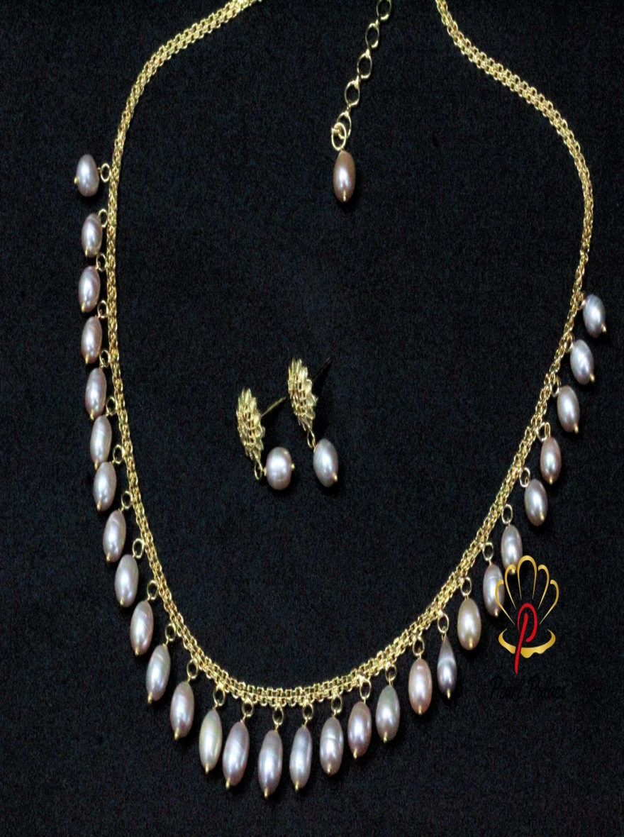Peach Rice Pearl and Gold-Plated Necklace and Earring Set.