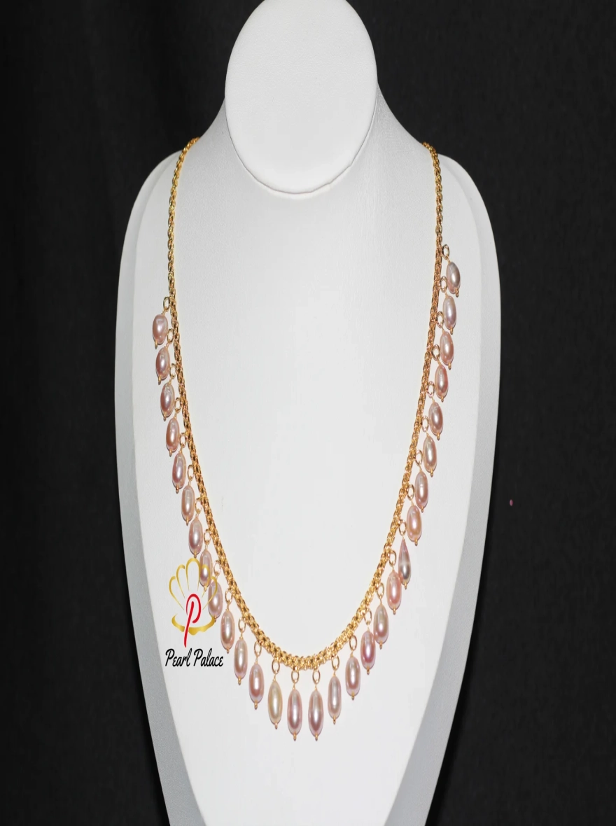 Peach Rice Pearl and Gold-Plated Necklace and Earring Set.