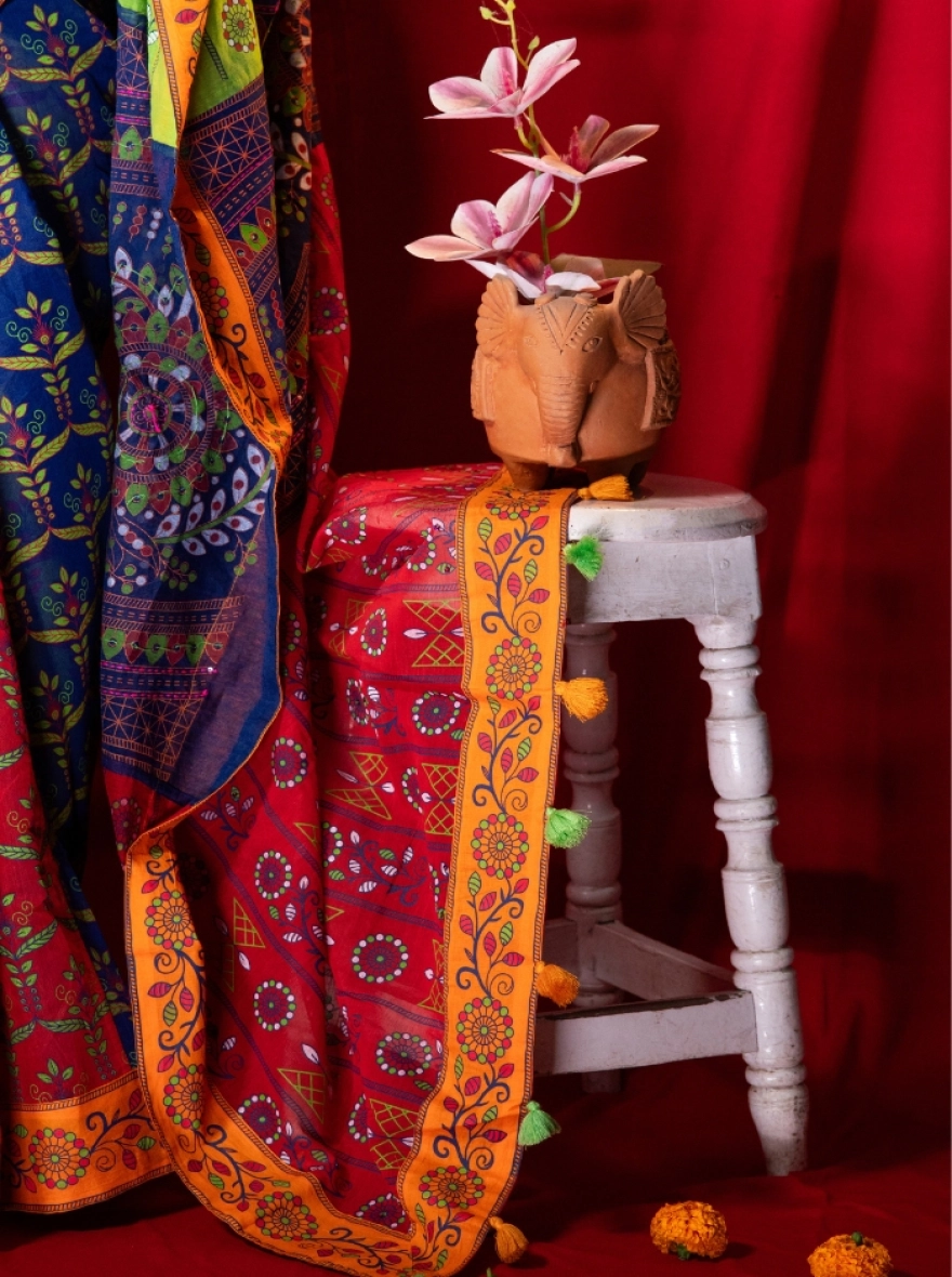 Prijosree Signature Boutique –Multicolour Weave Print Saree with tarsel and doller design