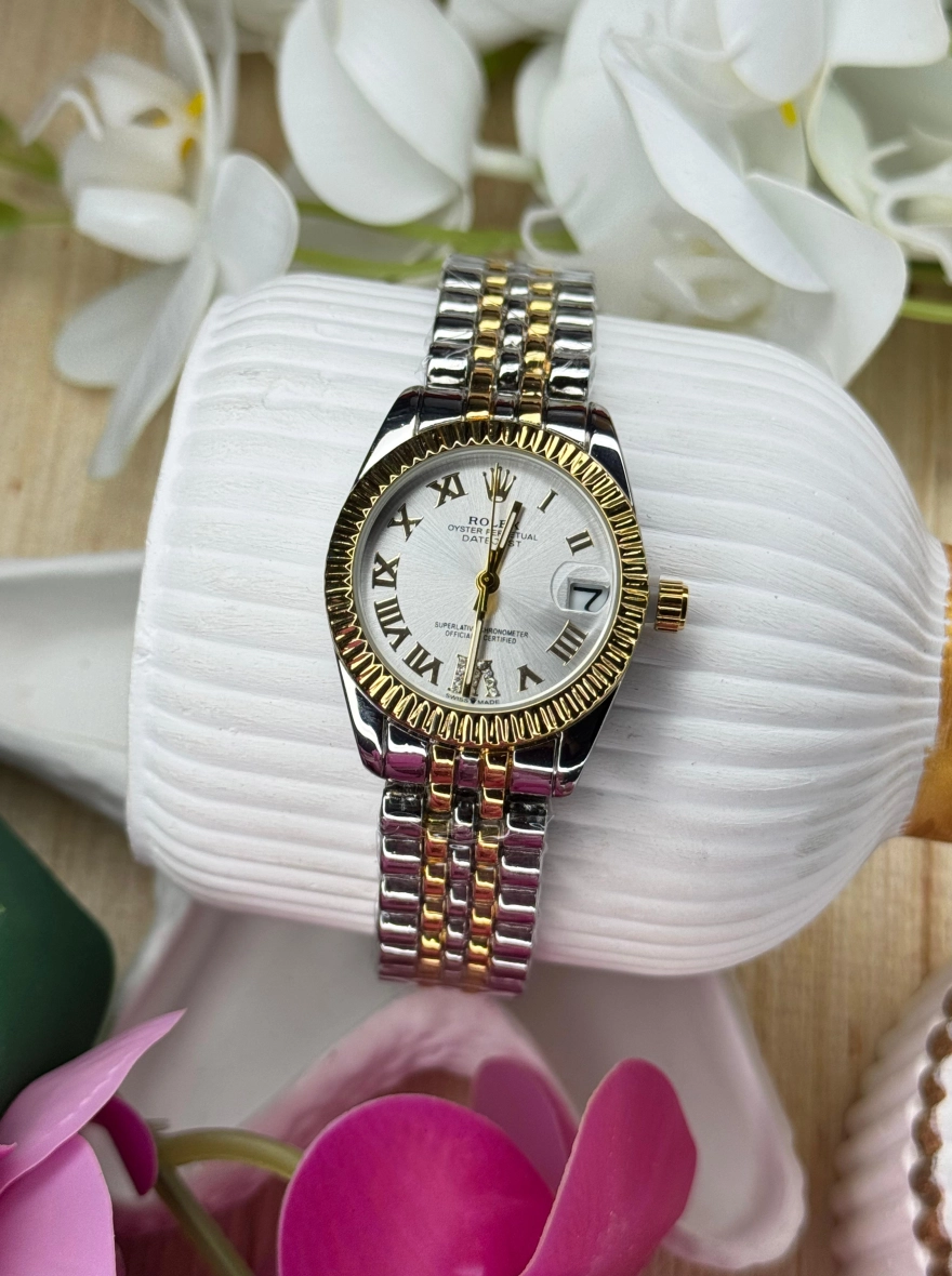 Rolex Datejust 31 – Oystersteel and 18 ct Yellow Gold with Silver Roman Dial